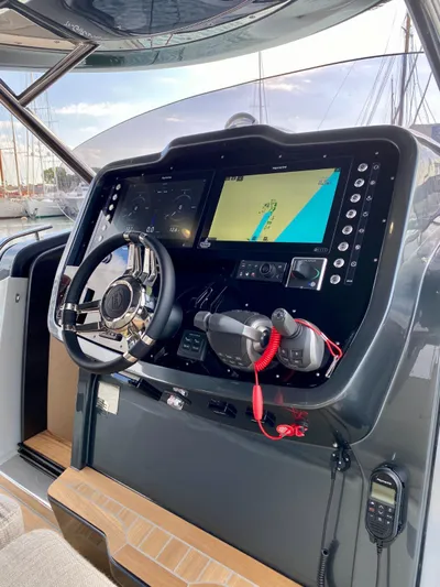 Seayou Yacht Photos Pics 2022 SACS Strider 15 dashboard with navigation system and steering wheel.