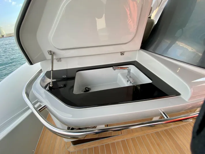 Seayou Yacht Photos Pics 2022 SACS Strider 15 yacht sink with open lid, sleek design, and modern fixtures.