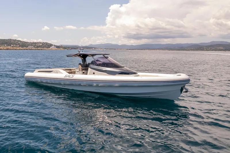 Seayou Yacht Photos Pics 2022 SACS Strider 15 luxury yacht cruising on open water under a partly cloudy sky.