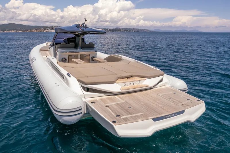 Seayou Yacht Photos Pics Luxury 2022 SACS Strider 15 yacht on open sea, featuring spacious deck and sleek design.