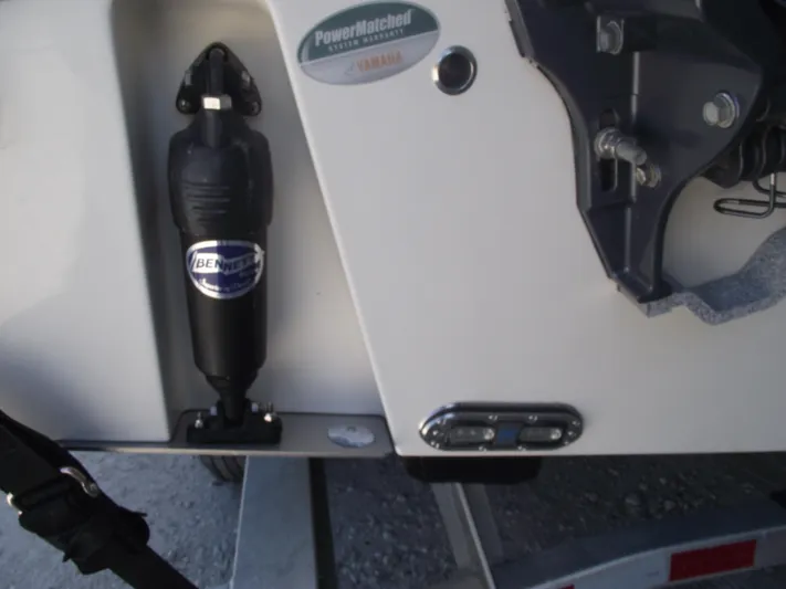  Yacht Photos Pics 2021 Cobia 301 Center Console boat detail showing engine mount and hydraulic component.