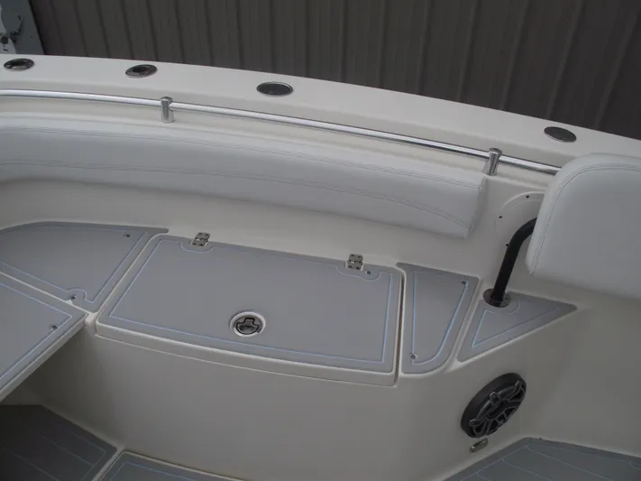  Yacht Photos Pics 2021 Cobia 301 Center Console boat interior with seating and storage compartments.