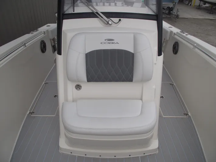  Yacht Photos Pics 2021 Cobia 301 Center Console boat interior with cushioned seating.