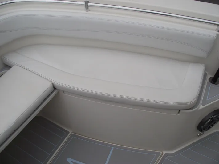  Yacht Photos Pics 2021 Cobia 301 Center Console boat interior seating with light upholstery.