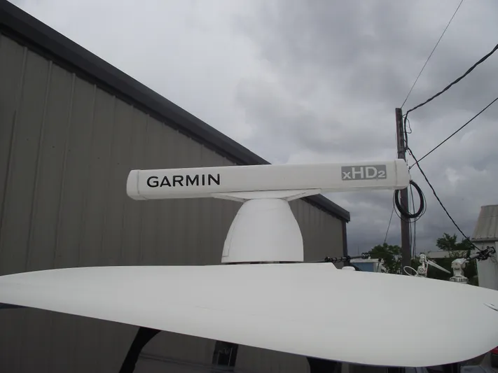  Yacht Photos Pics Garmin xHD2 radar on 2021 Cobia 301 Center Console boat under cloudy sky.