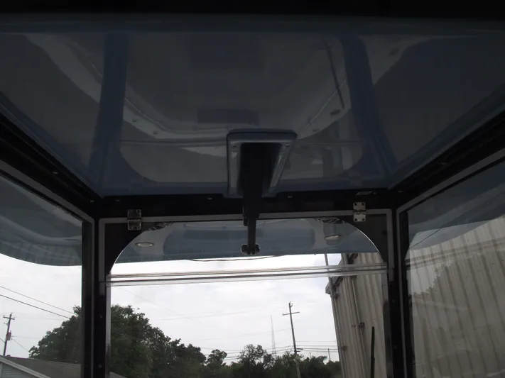  Yacht Photos Pics Interior view of a 2021 Cobia 301 Center Console boat's cabin ceiling.