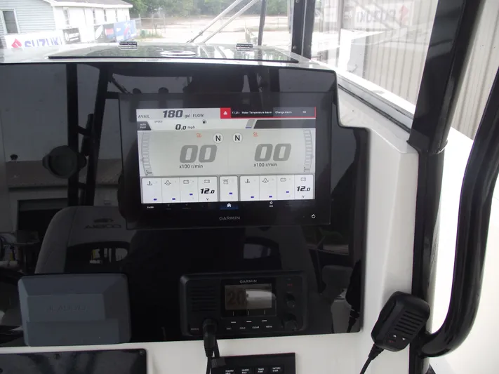  Yacht Photos Pics Cobia 301 Center Console 2021 dashboard with Garmin display and controls.