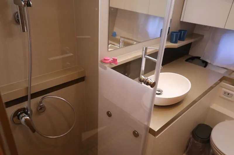  Yacht Photos Pics Modern bathroom in 2023 Greenline 45 Coupe yacht with shower and sink.