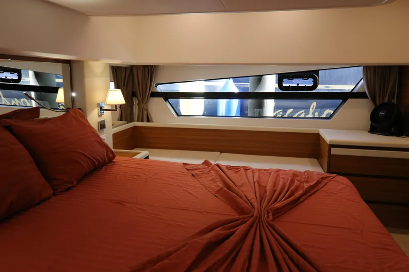  Yacht Photos Pics Luxurious cabin interior of 2023 Greenline 45 Coupe yacht with elegant bedding and modern design.