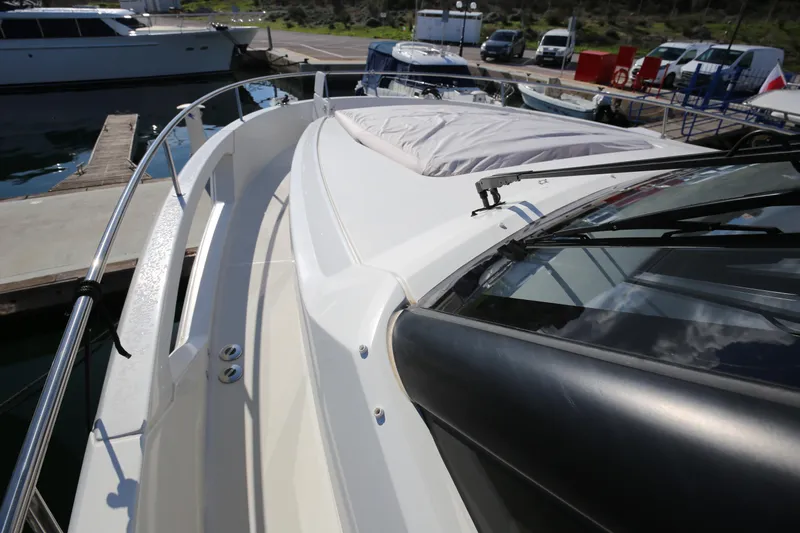  Yacht Photos Pics 2023 Greenline 45 Coupe yacht docked, showcasing sleek deck design and modern features.