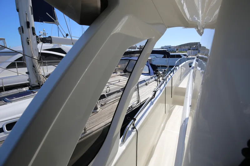  Yacht Photos Pics 2023 Greenline 45 Coupe yacht docked, showcasing sleek design and modern features.