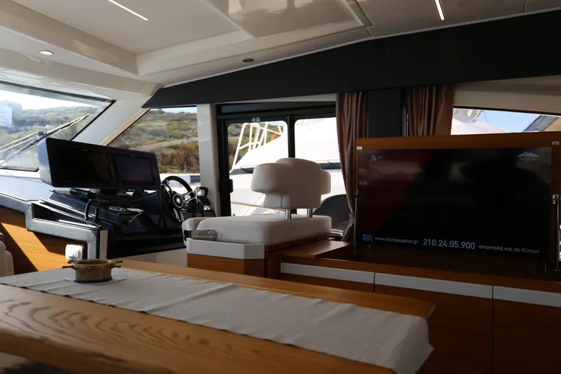  Yacht Photos Pics Interior of 2023 Greenline 45 Coupe yacht with modern helm and seating area.