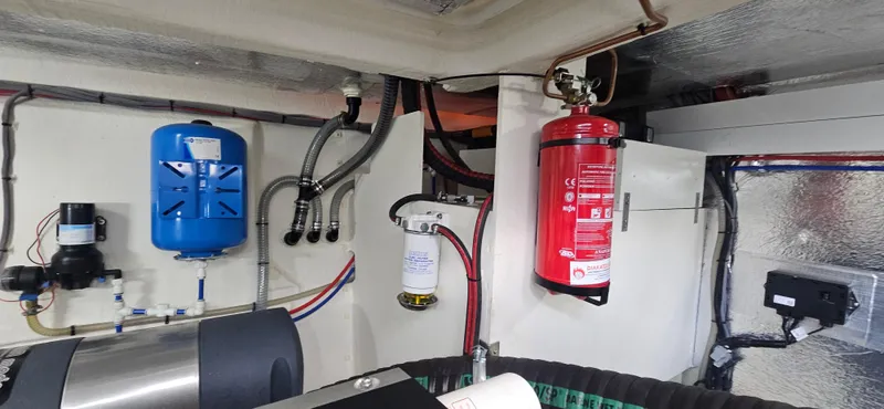 Yacht Photos Pics Engine room of 2023 Greenline 45 Coupe with fire extinguisher and equipment.