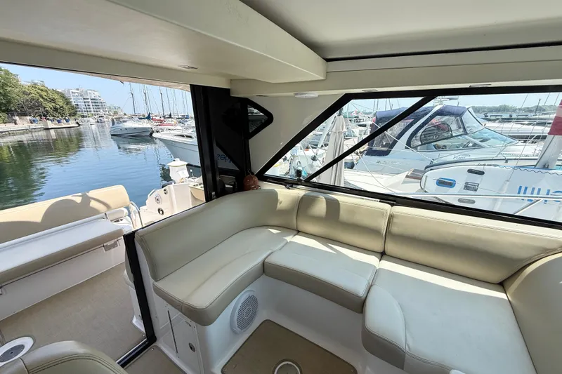  Yacht Photos Pics Interior of 2012 Regal 42 Sport Coupe yacht with marina view.