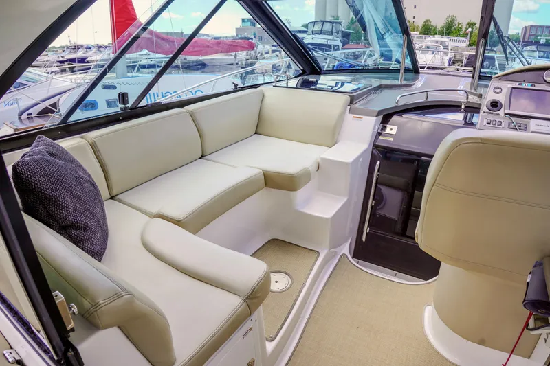  Yacht Photos Pics Luxurious interior of 2012 Regal 42 Sport Coupe yacht with plush seating.