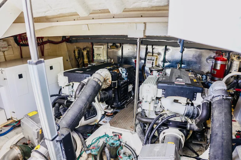  Yacht Photos Pics Engine room of 2012 Regal 42 Sport Coupe with dual engines and mechanical components.