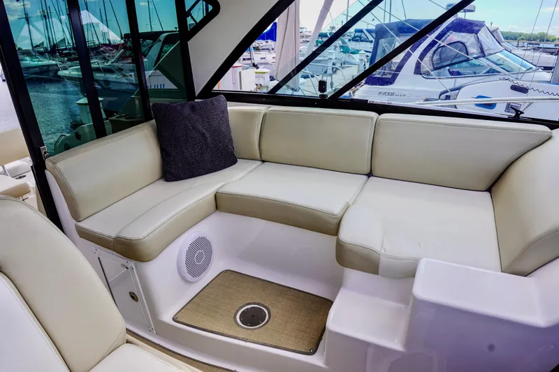  Yacht Photos Pics Luxurious seating area on 2012 Regal 42 Sport Coupe yacht, docked at marina.