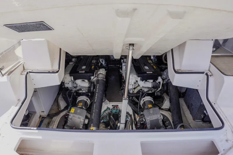  Yacht Photos Pics Engine compartment of a 2012 Regal 42 Sport Coupe boat, featuring Volvo Penta engines.