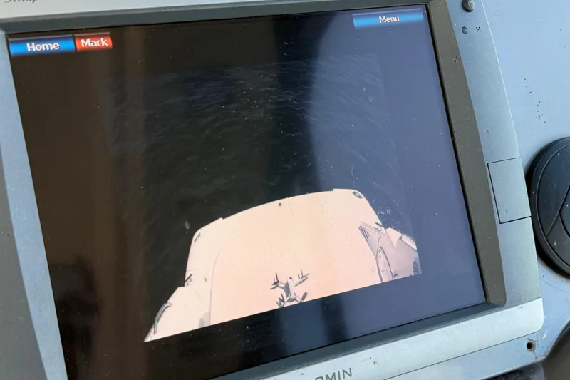  Yacht Photos Pics Boat navigation screen on 2012 Regal 42 Sport Coupe, displaying water and vessel's bow.