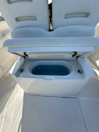  Yacht Photos Pics 2019 Jupiter 30 HFS boat with open storage compartment and seating.