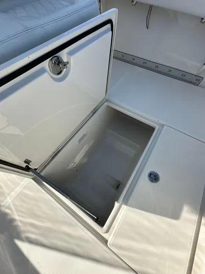  Yacht Photos Pics Open storage compartment on 2019 Jupiter 30 HFS boat deck.