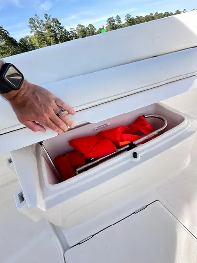  Yacht Photos Pics 2019 Jupiter 30 HFS boat storage compartment with life jackets and safety equipment.