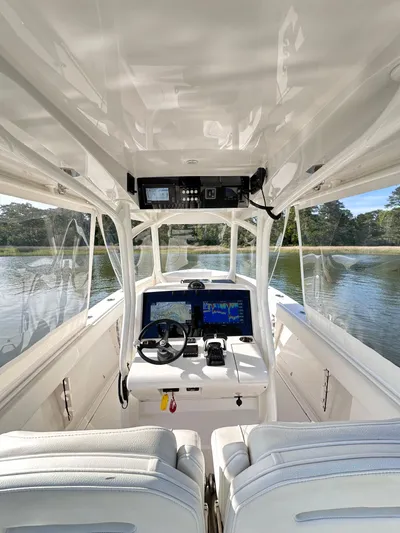  Yacht Photos Pics 2019 Jupiter 30 HFS boat interior with modern helm and dual seating.