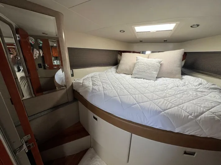 Happy Ours Yacht Photos Pics Luxurious cabin interior of 2005 Formula 40 PC yacht with cozy bedding.