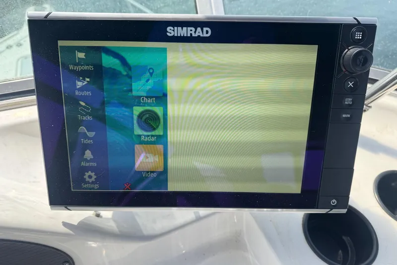 Lost Together Yacht Photos Pics Simrad navigation display on 1996 Bayliner 4087 Aft Cabin Motoryacht dashboard.