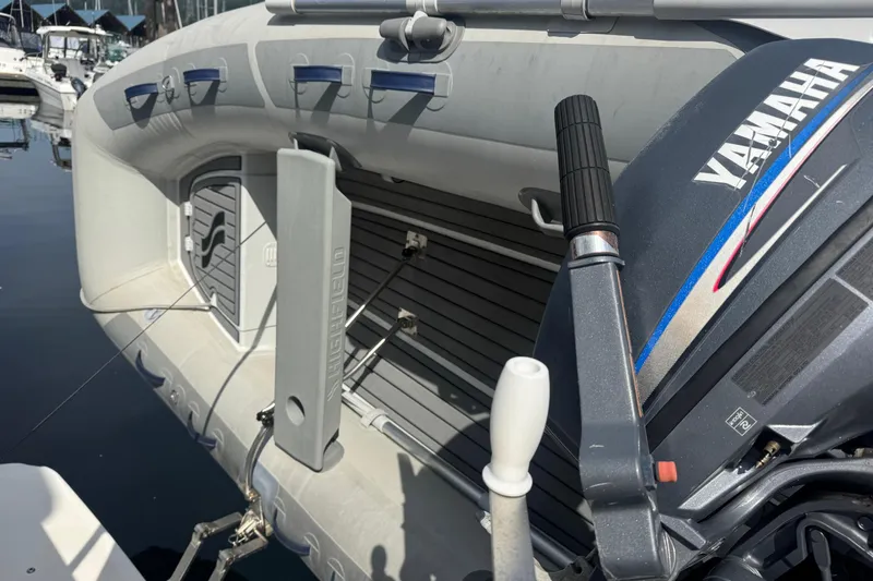 Lost Together Yacht Photos Pics Inflatable boat with Yamaha motor, docked near Bayliner 4087 Aft Cabin Motoryacht, 1996 model.