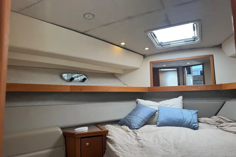 Lost Together Yacht Photos Pics 1996 Bayliner 4087 Aft Cabin Motoryacht interior with cozy bed and skylight.