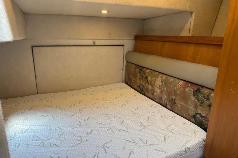 Lost Together Yacht Photos Pics 1996 Bayliner 4087 Aft Cabin Motoryacht interior cabin with bed and wood accents.