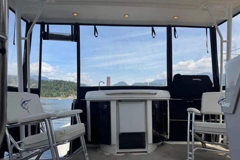 Lost Together Yacht Photos Pics 1996 Bayliner 4087 Aft Cabin Motoryacht interior with scenic water and mountain view.