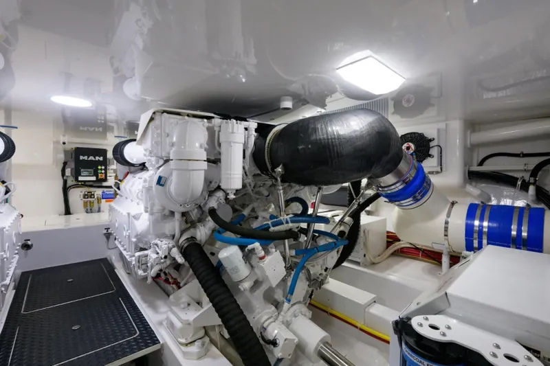 Andiamo Yacht Photos Pics Engine room of 2017 Viking 48 Convertible yacht, featuring advanced machinery and equipment.
