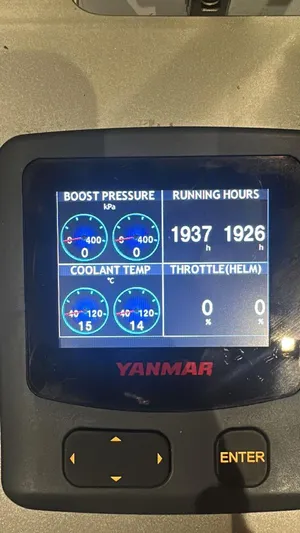 Dolphin Yacht Photos Pics Yanmar engine display showing boost pressure, running hours, coolant temperature, and throttle for Sunreef 50, 2019.
