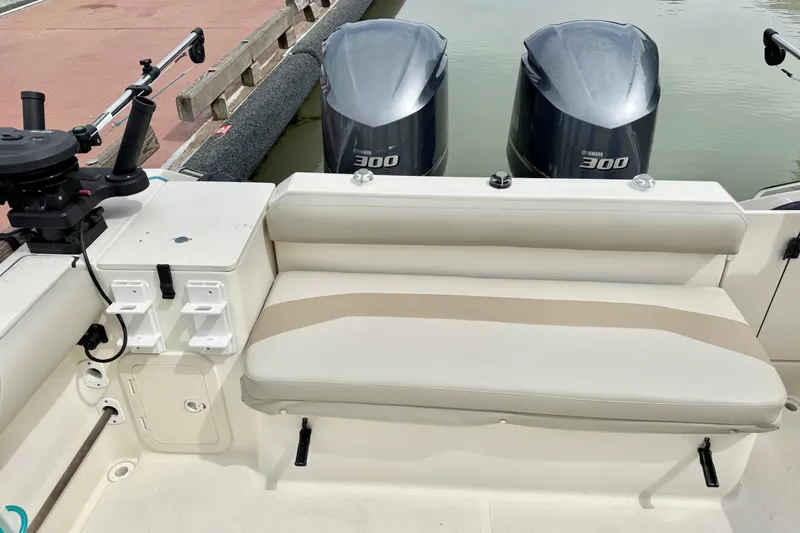  Yacht Photos Pics 2004 Pursuit 2870 Walkaround boat with twin Yamaha 300 engines and fishing rod holders.