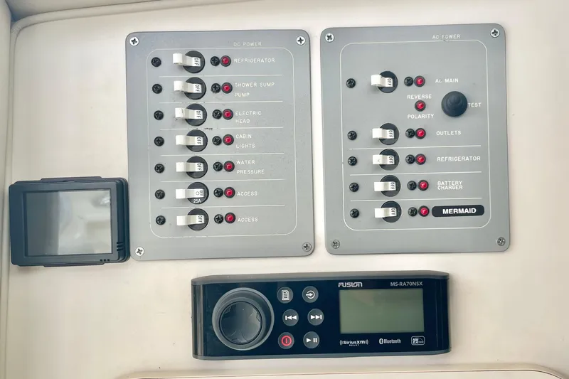  Yacht Photos Pics Electrical control panel on a 2004 Pursuit 2870 Walkaround boat.