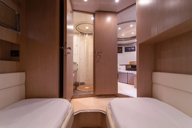  Yacht Photos Pics Interior of 2007 Riva Rivale 52 yacht with twin beds and modern design.