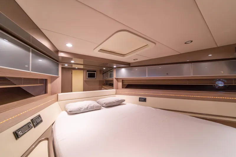  Yacht Photos Pics Luxurious interior of a 2007 Riva Rivale 52 yacht cabin with modern design.