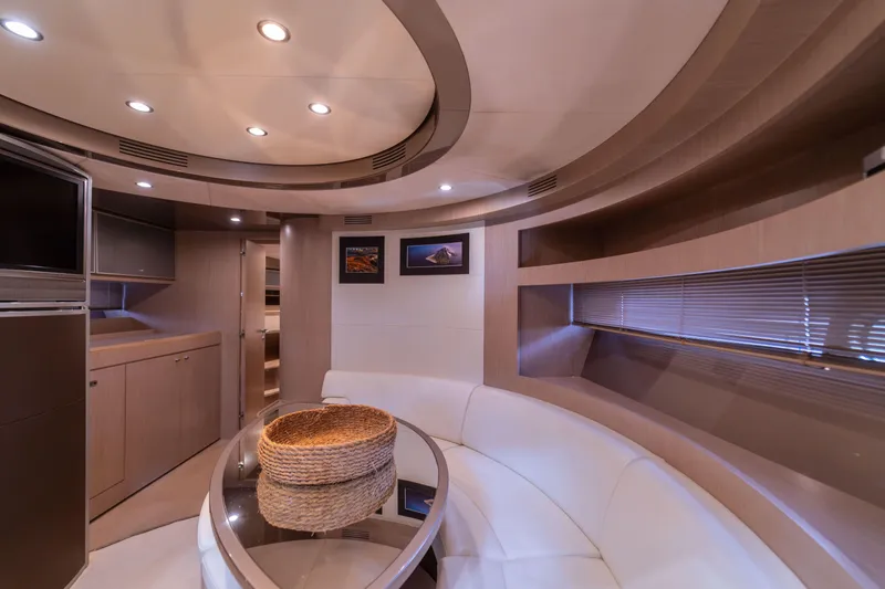  Yacht Photos Pics Luxurious interior of 2007 Riva Rivale 52 yacht with modern seating and elegant decor.