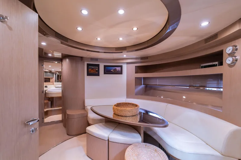  Yacht Photos Pics Luxurious interior of 2007 Riva Rivale 52 yacht with elegant seating and modern design.