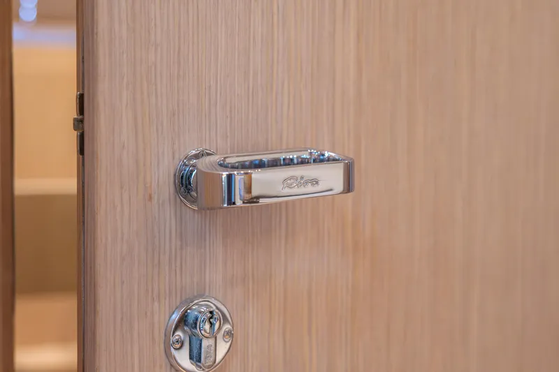  Yacht Photos Pics Chrome door handle on Riva Rivale 52 yacht, 2007 model.