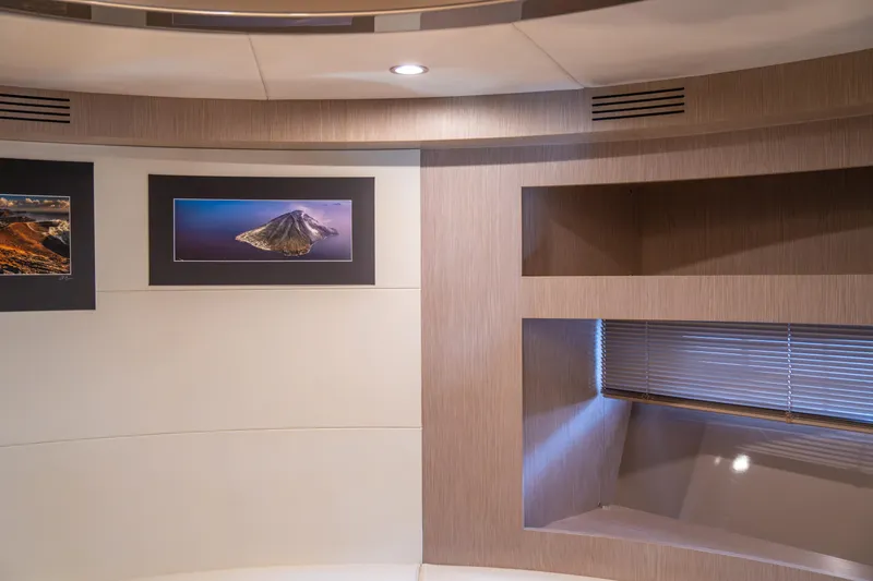  Yacht Photos Pics Interior of 2007 Riva Rivale 52 yacht with modern decor and framed artwork.