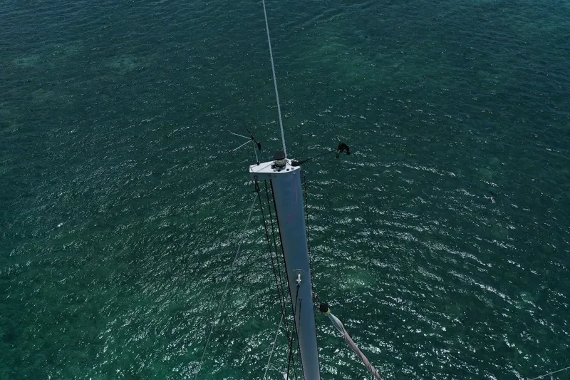 Viewfinder Yacht Photos Pics Aerial view of Bali 4.1 sailboat mast over clear ocean waters, 2020 model.