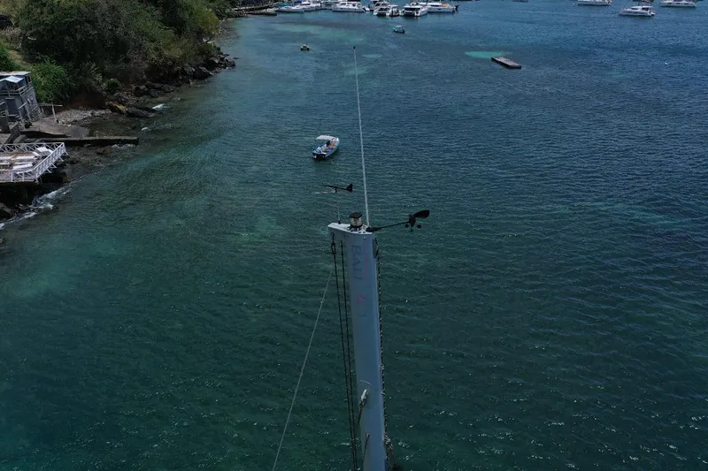 Viewfinder Yacht Photos Pics Aerial view of Bali 4.1 catamaran mast in clear coastal waters, 2020.