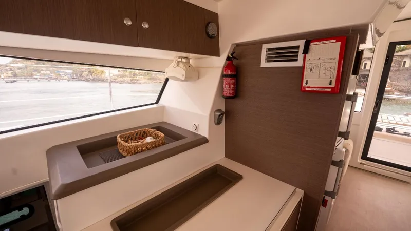 Viewfinder Yacht Photos Pics Modern kitchen area in a 2020 Bali 4.1 yacht with a window view.