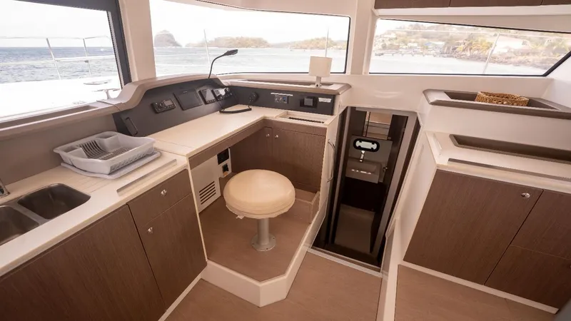 Viewfinder Yacht Photos Pics Interior of 2020 Bali 4.1 yacht with modern navigation station and panoramic windows.