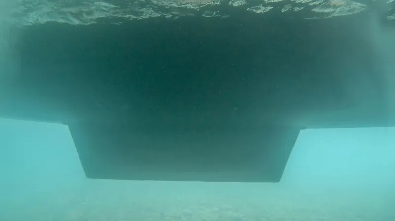 Viewfinder Yacht Photos Pics Underwater view of Bali 4.1 catamaran hull, 2020 model, in clear blue water.