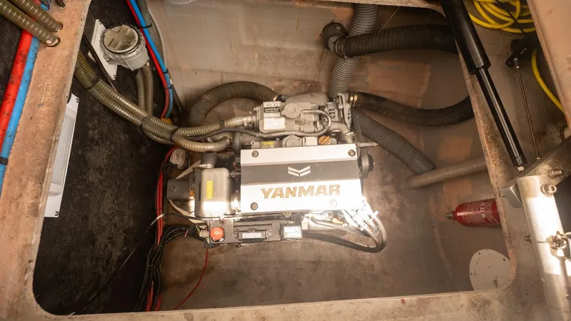 Viewfinder Yacht Photos Pics Engine compartment of a 2020 Bali 4.1 with Yanmar engine and visible wiring.