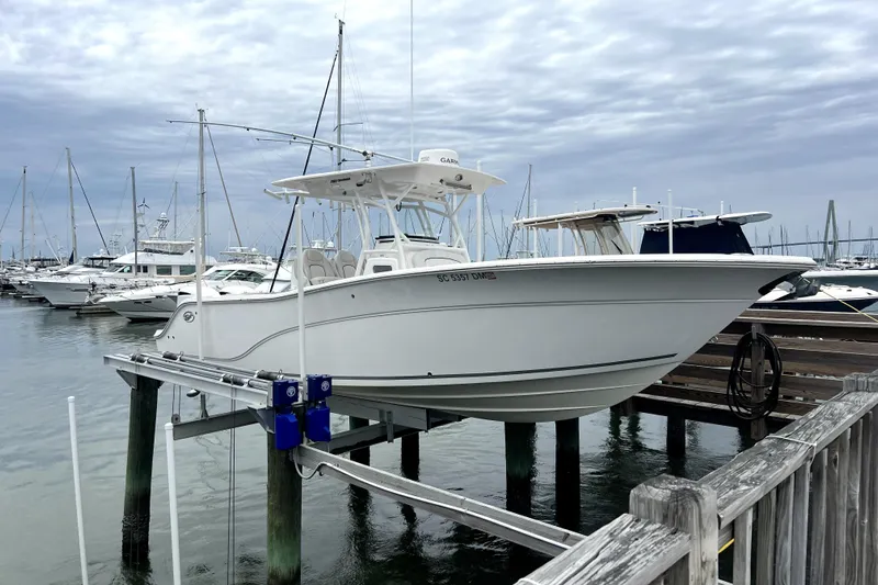  Yacht Photos Pics 2020 Sea Fox 288 Commander boat docked at marina with overcast sky.